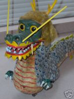 snappy dragon tin toy